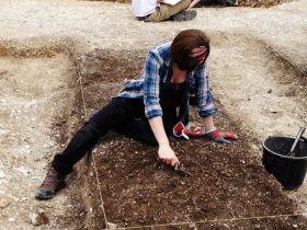 A person sitting on a bench