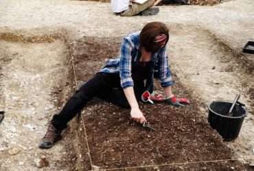 A person sitting on a bench